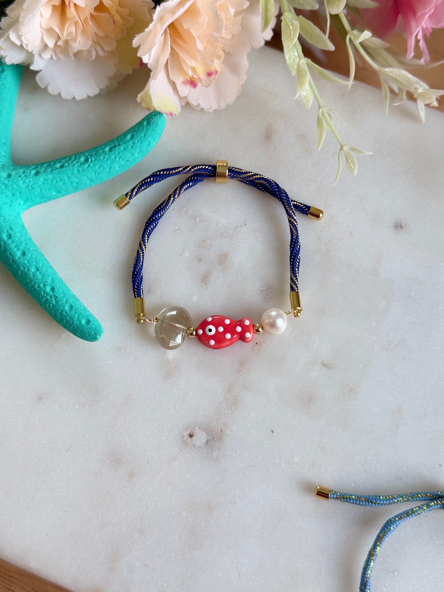 Pulsera Pecesitos (hilo nilón)
